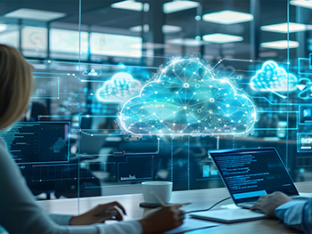 A woman with a white coffee cup and a man coding on a laptop in an office sitting near blue, electrified clouds.