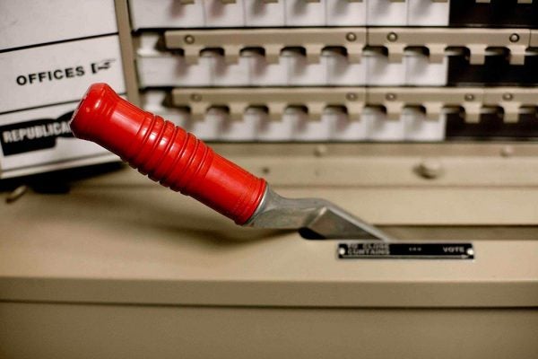 Close-up of a voting machine lever