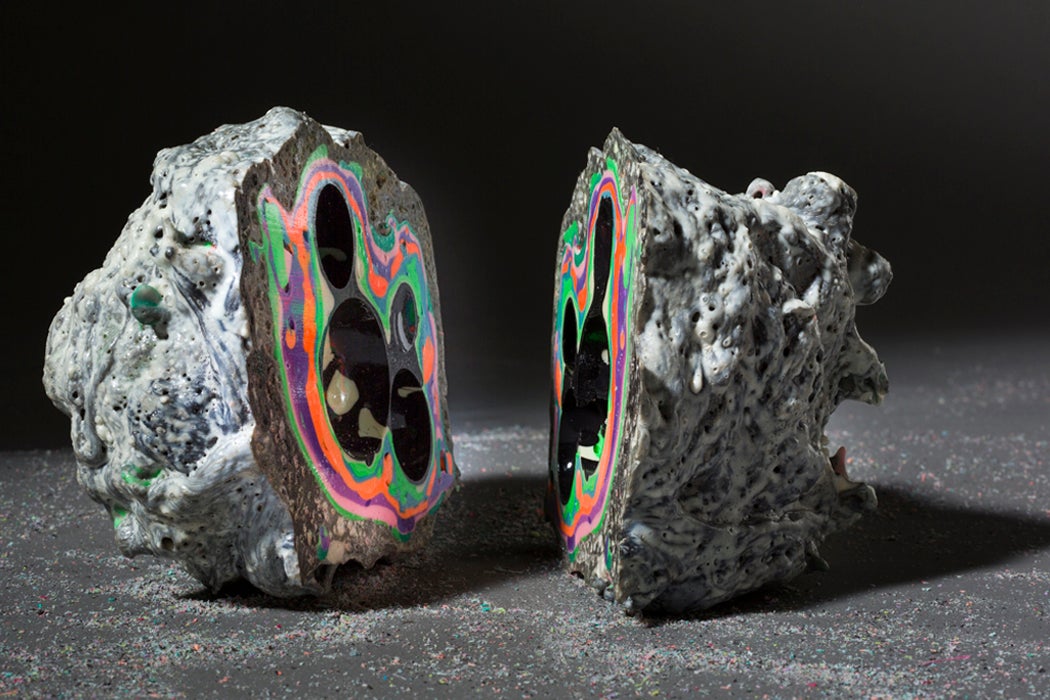 Sculpture of a geode divided in two with various neon colors inside; artist Elyse Graham