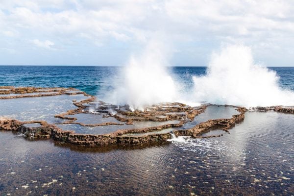 Crashing surf on the shore of a Tonga Island