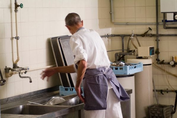 A dishwasher at work