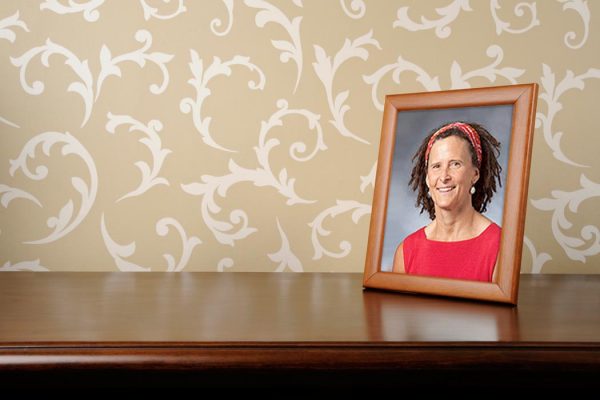 Framed photograph of a woman in red