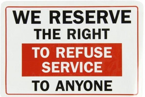 Signage reading, "We reserve the right to refuse service to anyone."