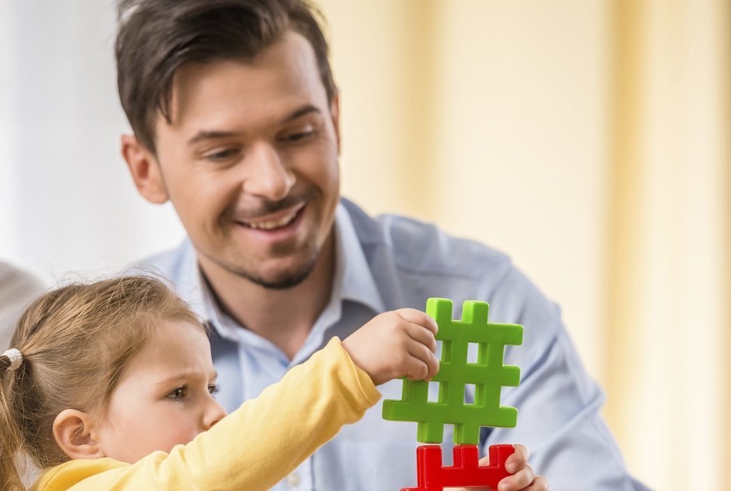 A child playing with a caretaker