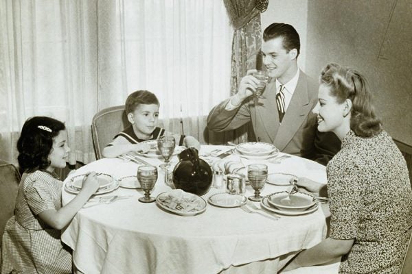 Family sitting around the dinner table.