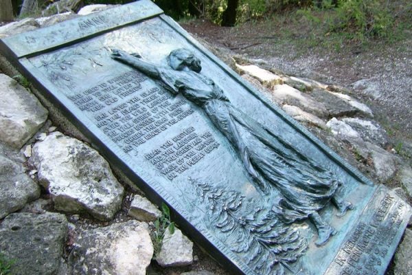 Anne's Tablet (1916) by William Ordway Partridge to honor Constance Fenimore Woolson, Mackinac Island, Michigan.