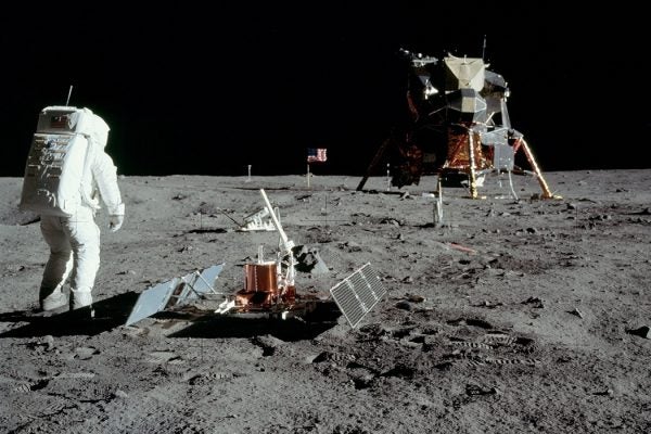 Buzz Aldrin with equipment on the moon