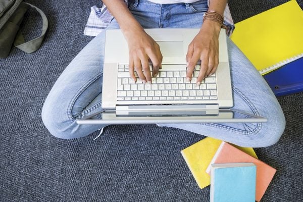 student using laptop