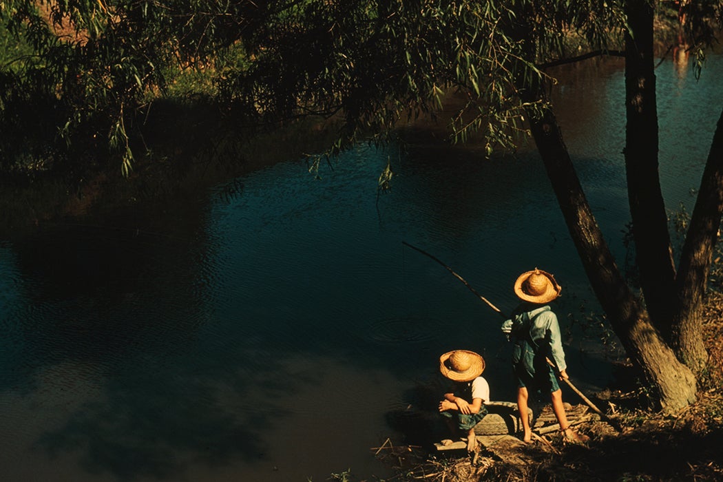 Boys fishing in a bayou, Schriever, LA, 1940