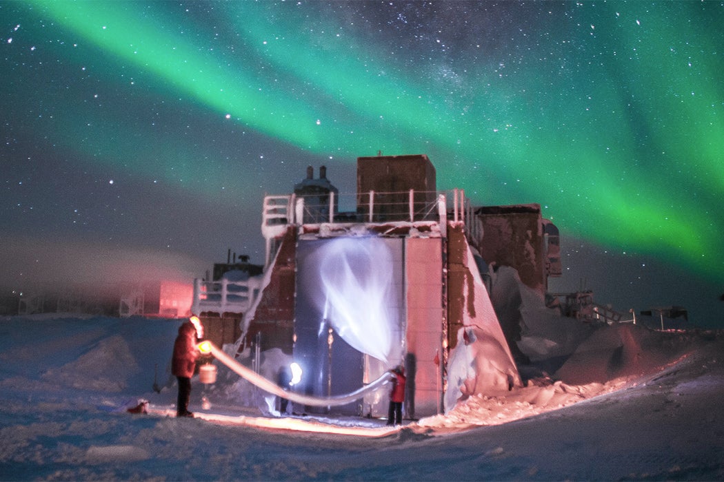 NOAA researcher prepares to release an ozone sonde