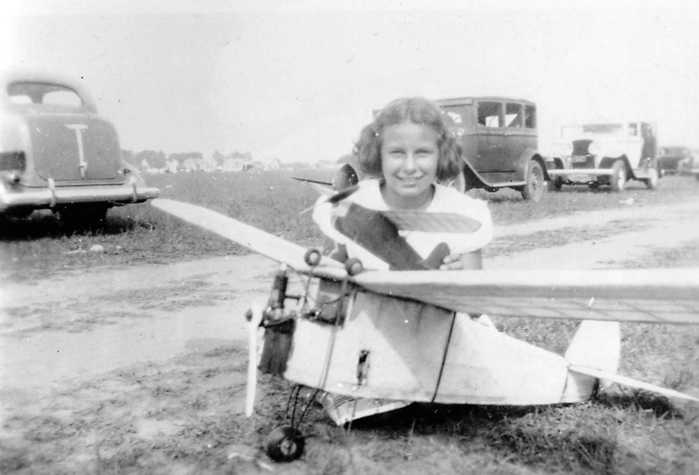 Girl with model plane