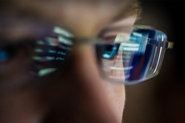 A computer screen reflected in glasses