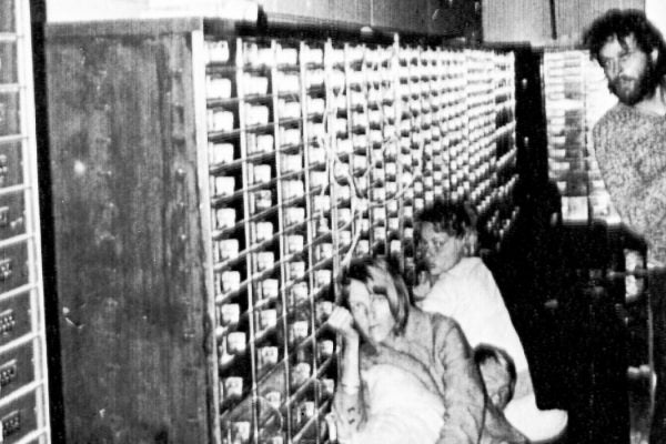 Three of the four hostages and bank robber Clark Olofsson, standing right, in a bank in Stockholm, Sweden, Aug. 27, 1973