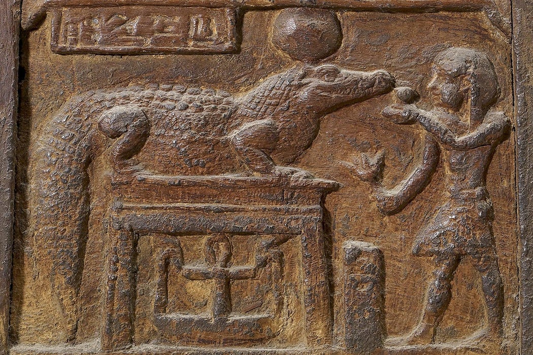 A chest depicting a king making an offering to the crocodile-god Sobek