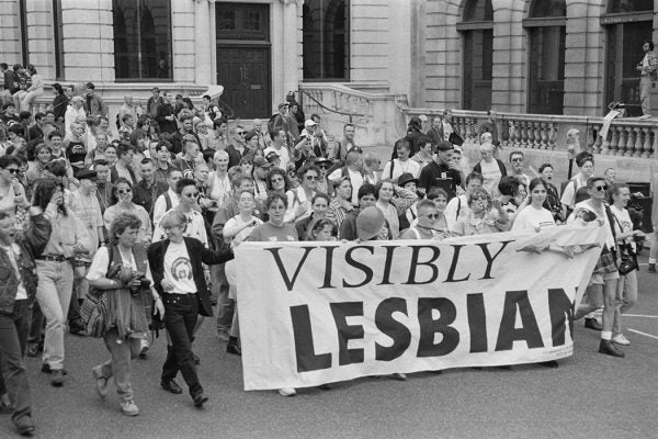 Photograph: Marchers carrying a banner with the words 'Visibly Lesbian'

Source: Steve Eason/Getty 