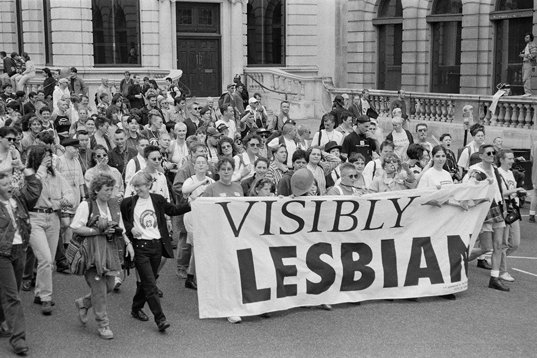 Photograph: Marchers carrying a banner with the words 'Visibly Lesbian'

Source: Steve Eason/Getty 