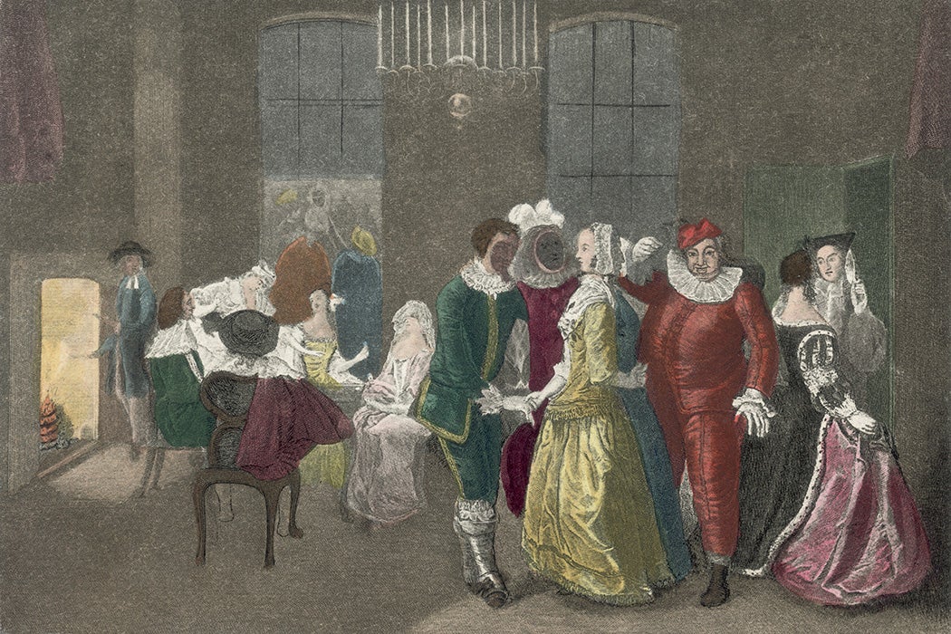 Revellers at a masked ball 