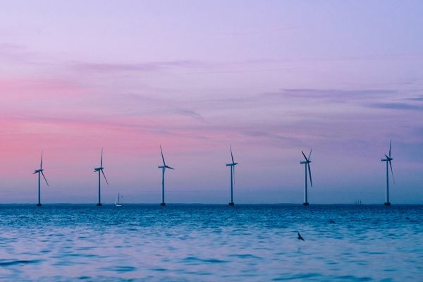 Scenic View Of Wind Turbines Against Sky During Sunset