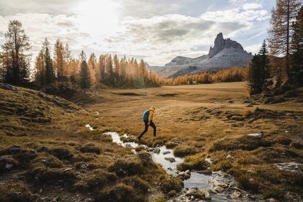 A person hiking off-trail