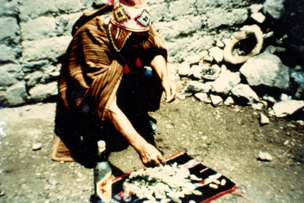 Andean ritual with coca leaves