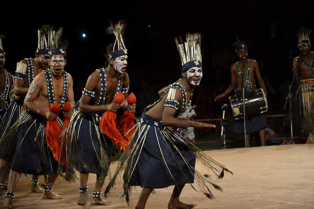 tribal men from gujrat state performs sighi dhamaal dance