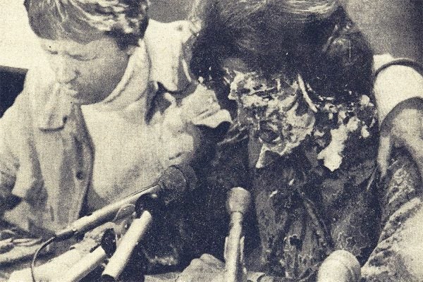 Anita Bryant is hit in the face with a pie during a press conference on October 14, 1977