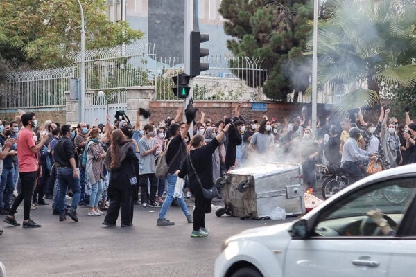 People gather in protest against the death of Mahsa Amini along the streets on September 19, 2022 in Tehran, Iran.