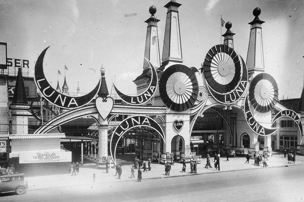 People outside the entrance to Luna Park on Coney Island, New York