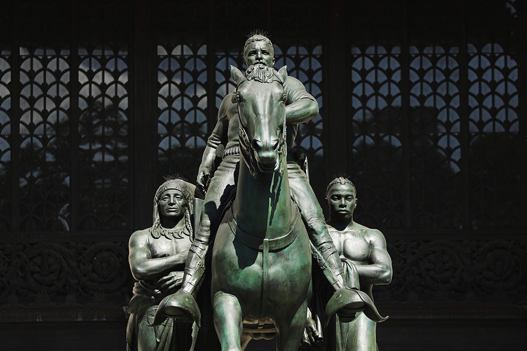 The statue of former President Theodore Roosevelt, who also served as New York state governor, stands in front of the Museum of Natural History on June 22, 2020 in New York City. The statue, which also features a Native American and a Black man standing at his side, has since been removed from the Museum of Natural History.