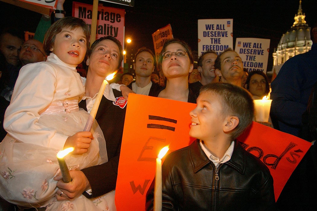 A gay couple and their children attend a rally on the steps of the California Supreme Court March 11, 2004 in San Francisco.