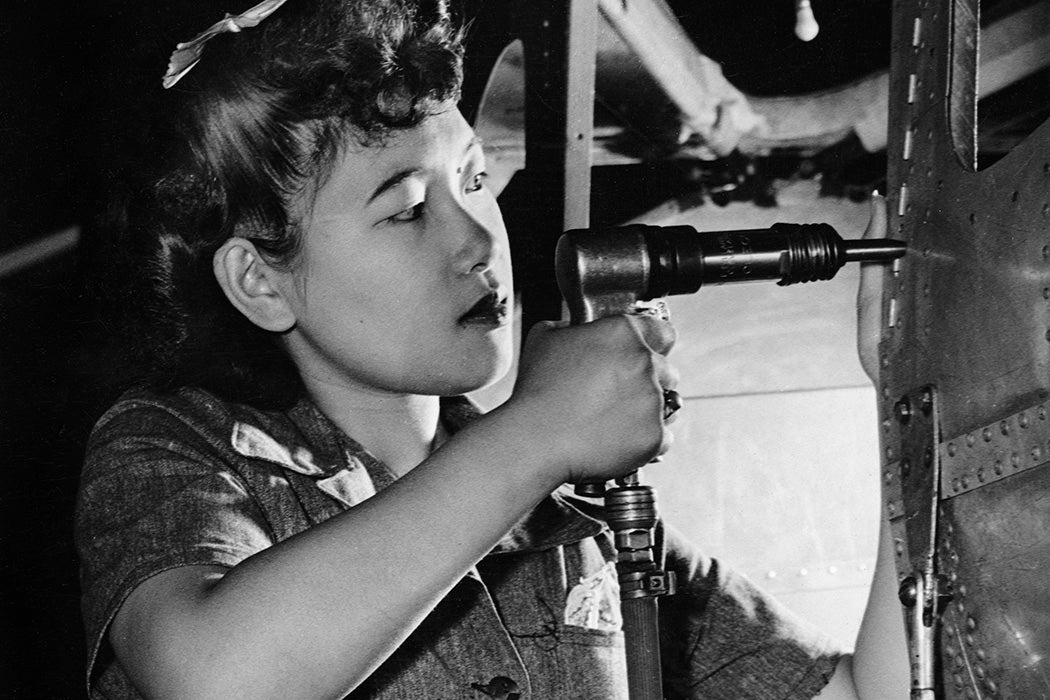 A riveter at work, circa 1940.