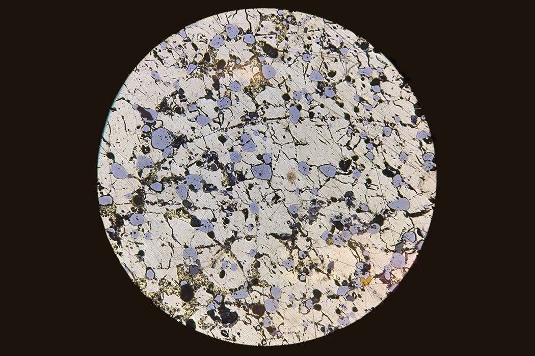 Photomicrograph image of pyrrhotite under a reflected light ore microscope