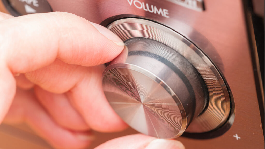 Hand on volume control