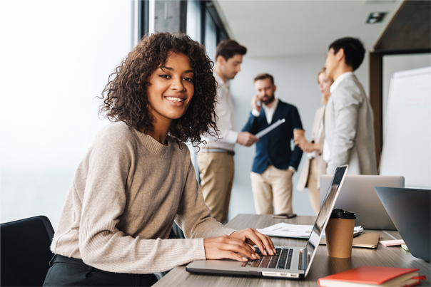 Female on laptop depicting a Young Professional at work