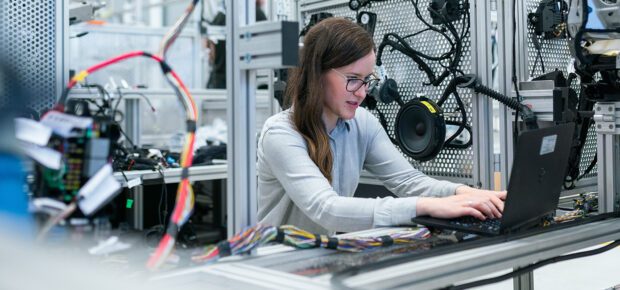 Female electronics engineer runs vehicle tests