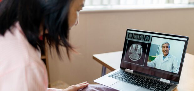 Person interacting with doctor Virtually