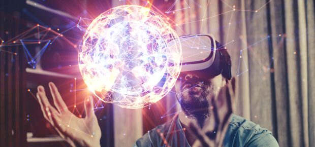 Boy Browsing a Virtual World in Virtual Reality Glasses