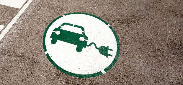 symbol indicating a place to charge an electric car with energy in Catalonia Spain