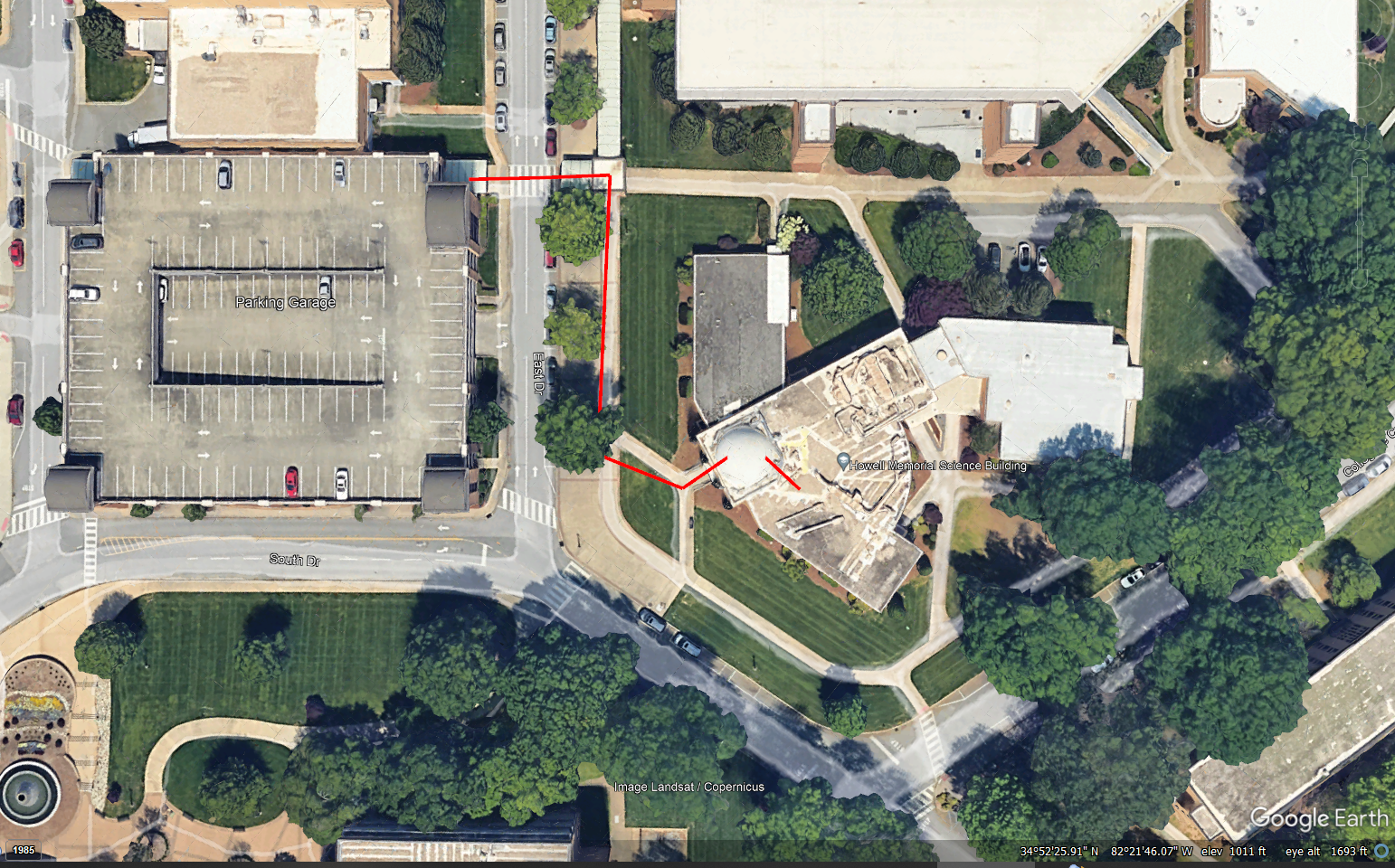 Satellite Image Depicting Parking Ramp and Building Entrance