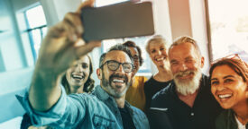 Group of business people taking a selfie