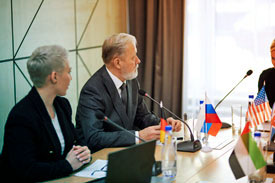 Officials at a policy meeting