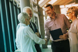 Group of volunteers shaking hands