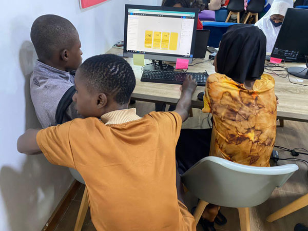 Students learning on donated computers.